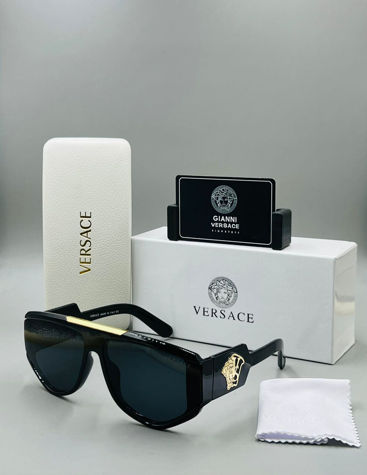 Varsace Sunglasses. Black