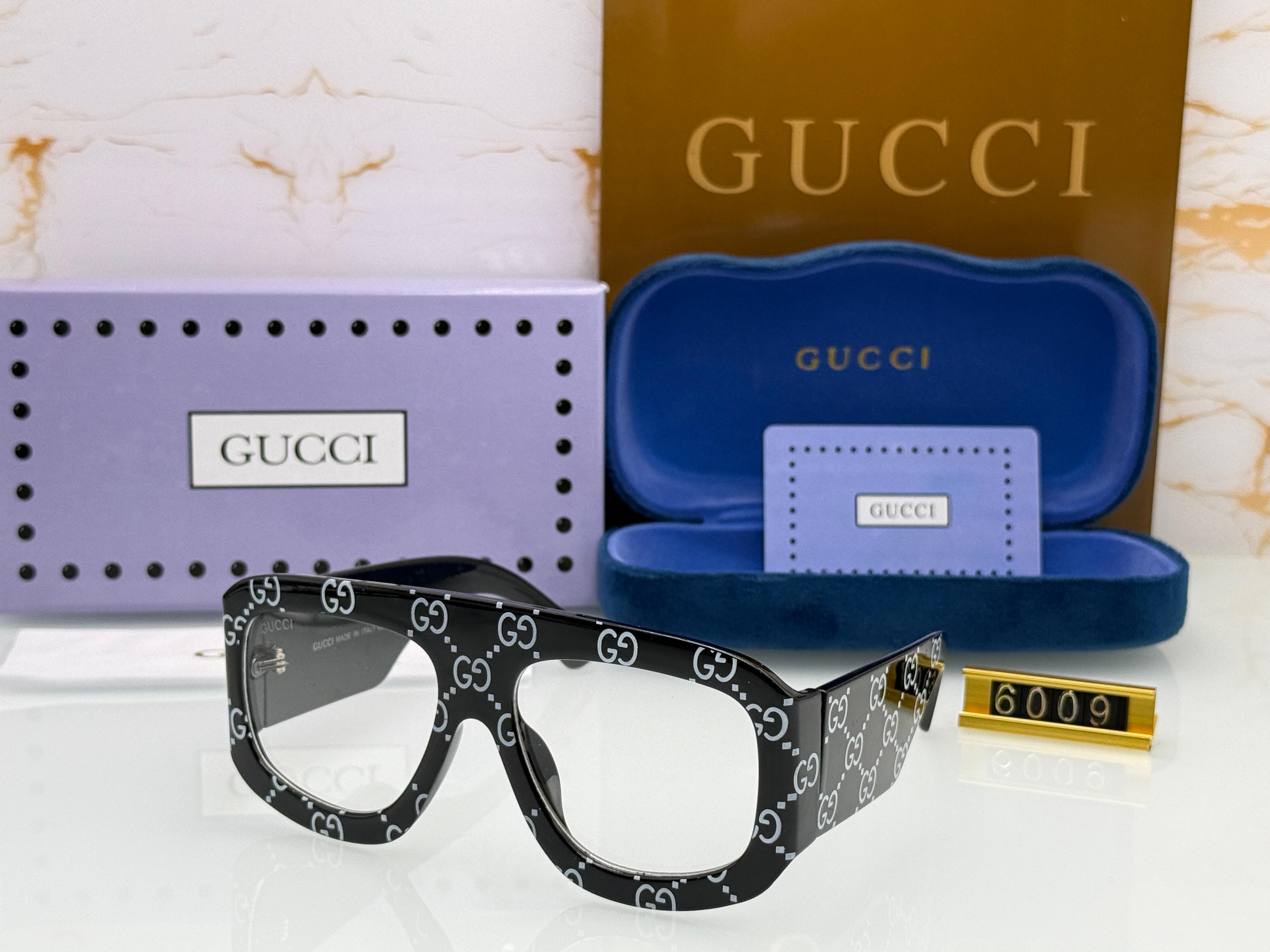 GUCHI 6009 SUNGLASSES BLACK TO CLEAR1